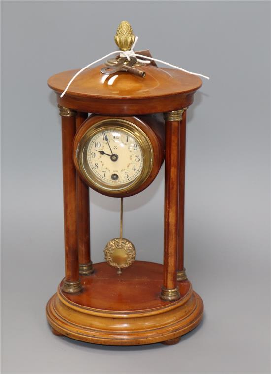 A four pillar mahogany portico mantel clock H.32cm